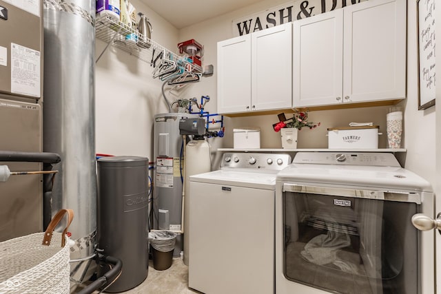 10585 Windward Dr, Indianapolis, IN 46234 - washroom with cabinet space, separate washer and dryer, electric water heater, and tile patterned floors
