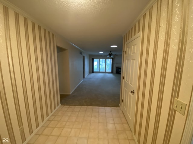3910 S Baytree Ln, Bloomington, IN 47401 - corridor with light carpet, recessed lighting, and a textured ceiling