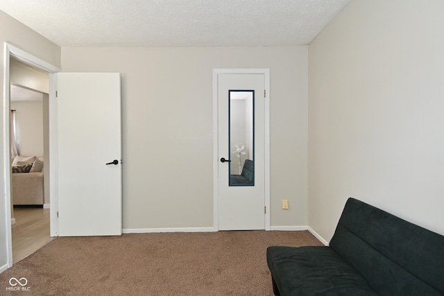 5936 Beau Jardin Dr, Indianapolis, IN 46237 - sitting room featuring carpet floors and a textured ceiling