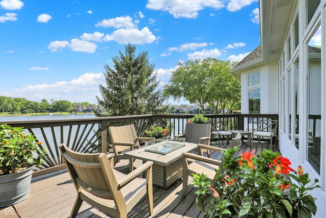 11137 Peppermill Ln, Fishers, IN 46037 - deck with a water view and a fire pit