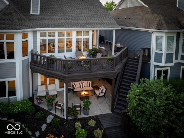 11137 Peppermill Ln, Fishers, IN 46037 - rear view of property featuring a fire pit, stairway, roof with shingles, a patio area, and a wooden deck