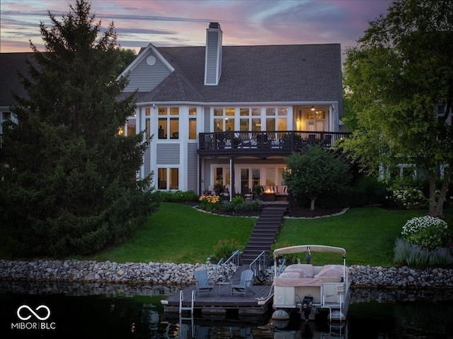 11137 Peppermill Ln, Fishers, IN 46037 - rear view of house with stairway, a lawn, a chimney, and a deck
