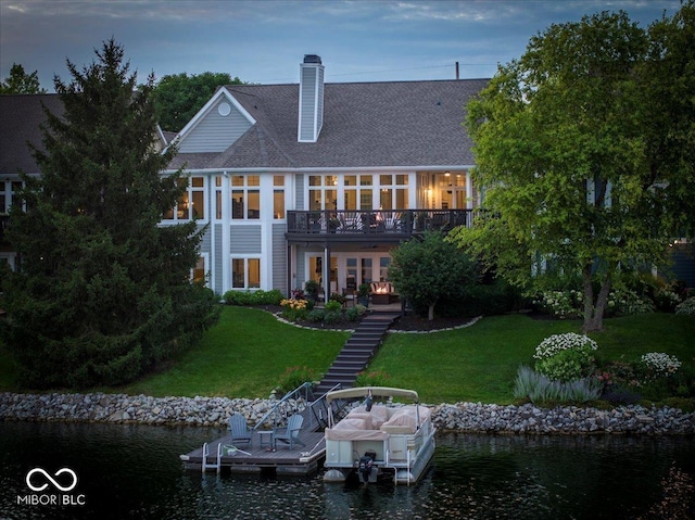 11137 Peppermill Ln, Fishers, IN 46037 - rear view of property featuring a yard, stairs, a chimney, and a deck with water view
