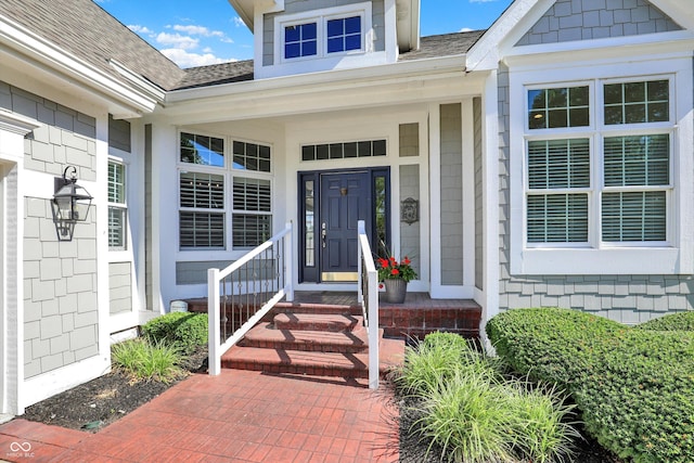 11137 Peppermill Ln, Fishers, IN 46037 - doorway to property featuring roof with shingles and a porch