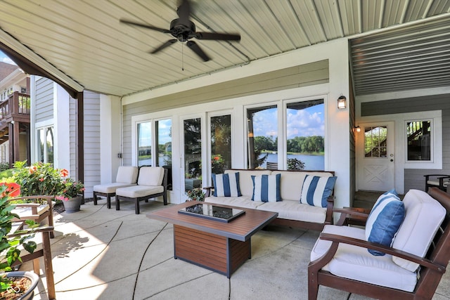 11137 Peppermill Ln, Fishers, IN 46037 - view of patio with an outdoor living space with a fire pit, a water view, and a ceiling fan