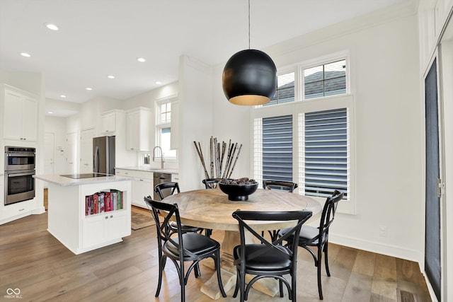 11137 Peppermill Ln, Fishers, IN 46037 - dining space featuring wood-type flooring and recessed lighting