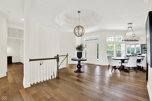 11137 Peppermill Ln, Fishers, IN 46037 - entrance foyer featuring a chandelier, hardwood / wood-style floors, and crown molding
