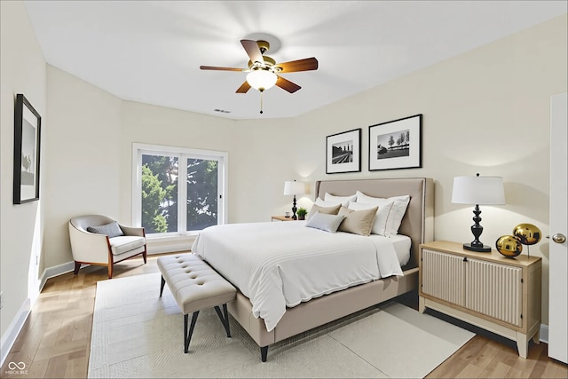 11137 Peppermill Ln, Fishers, IN 46037 - bedroom with light wood-type flooring and a ceiling fan