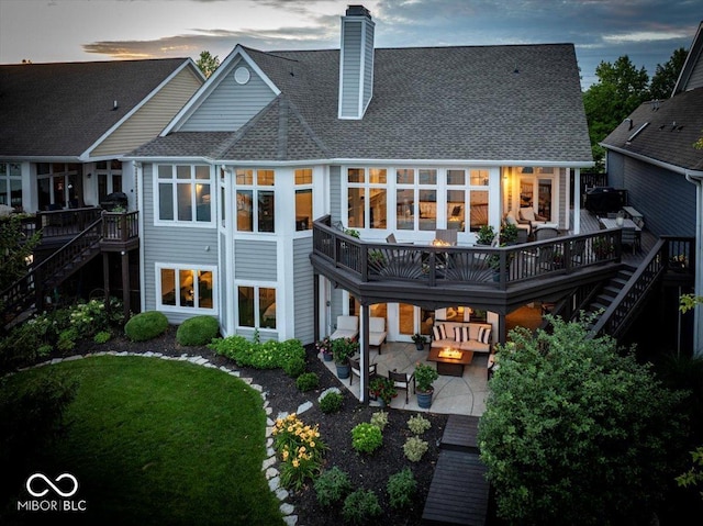 11137 Peppermill Ln, Fishers, IN 46037 - back of property featuring stairs, a patio area, a deck, a fire pit, and a chimney
