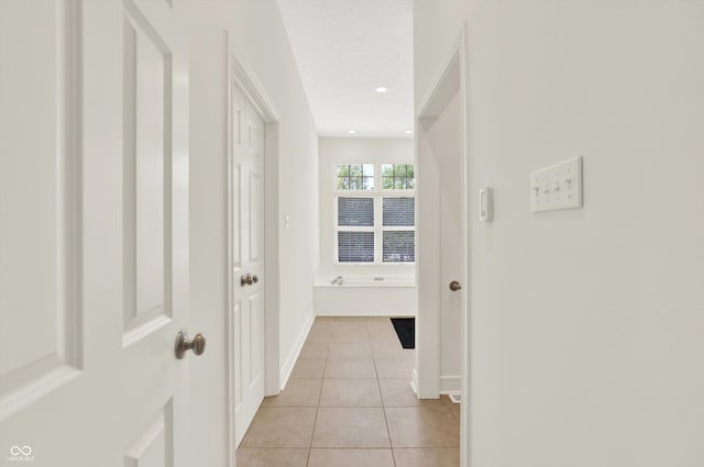 11137 Peppermill Ln, Fishers, IN 46037 - hall featuring light tile patterned floors and recessed lighting