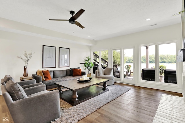 11137 Peppermill Ln, Fishers, IN 46037 - living room featuring wood finished floors, a ceiling fan, and recessed lighting