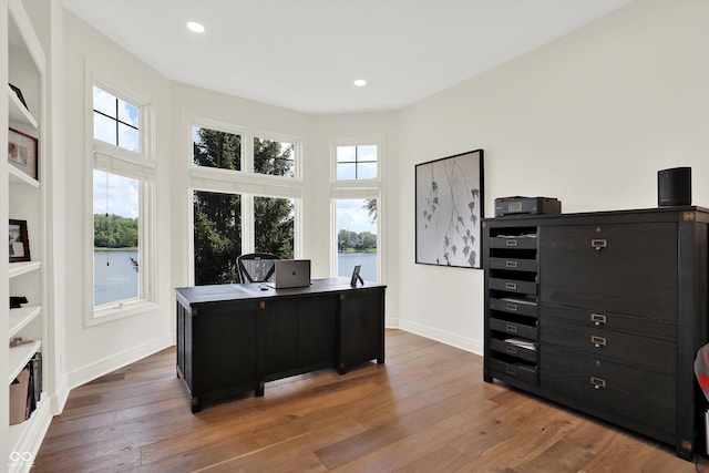 11137 Peppermill Ln, Fishers, IN 46037 - office area featuring hardwood / wood-style floors, recessed lighting, and a water view
