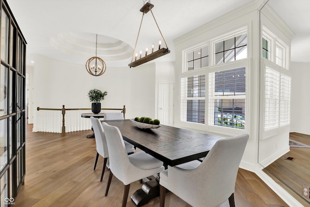 11137 Peppermill Ln, Fishers, IN 46037 - dining room featuring a chandelier and wood finished floors
