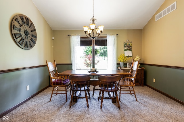 20136 Stone Church Rd, Laurel, IN 47024 - dining space featuring a chandelier and carpet floors