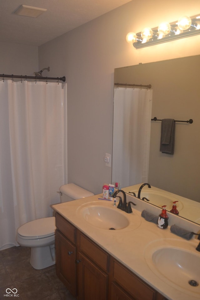 10166 Ranford Blvd, Fishers, IN 46040 - bathroom with double vanity, tile patterned flooring, and curtained shower