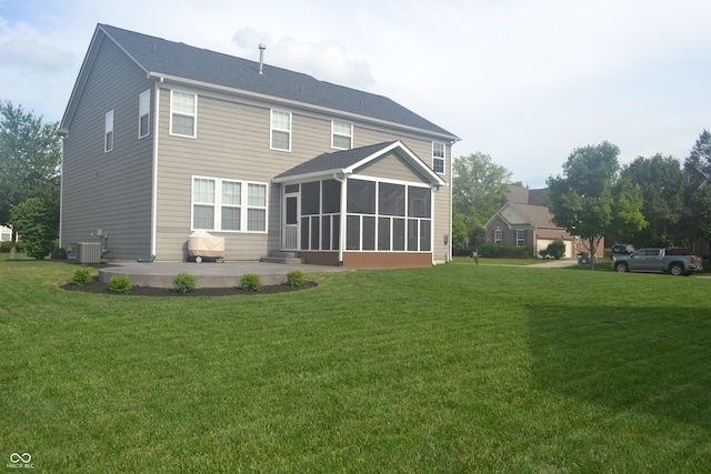 10166 Ranford Blvd, Fishers, IN 46040 - back of property featuring a sunroom, a patio area, and a lawn