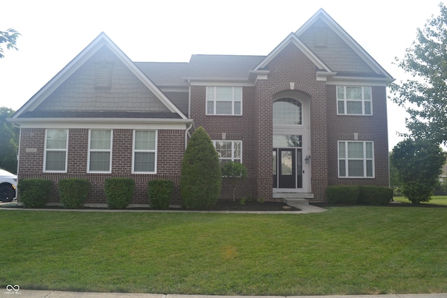 10166 Ranford Blvd, Fishers, IN 46040 - view of front of home with brick siding and a front lawn