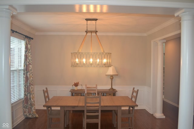 10166 Ranford Blvd, Fishers, IN 46040 - dining space featuring ornate columns, dark wood finished floors, a decorative wall, a wainscoted wall, and crown molding