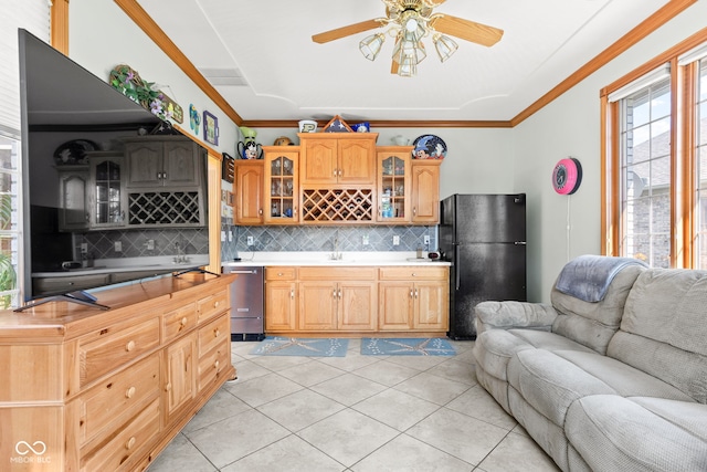 2320 Whispering Way, Indianapolis, IN 46239 - kitchen with freestanding refrigerator, open floor plan, stainless steel dishwasher, backsplash, and ornamental molding
