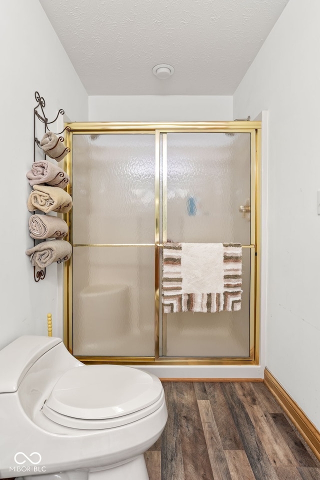 2320 Whispering Way, Indianapolis, IN 46239 - bathroom featuring wood finished floors and a stall shower