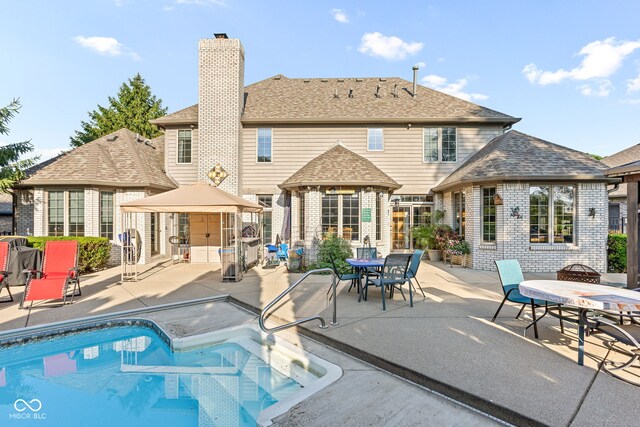 2320 Whispering Way, Indianapolis, IN 46239 - swimming pool featuring a patio and a gazebo