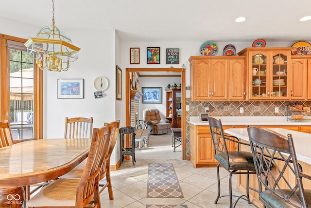2320 Whispering Way, Indianapolis, IN 46239 - dining space featuring a chandelier, light tile patterned floors, and recessed lighting