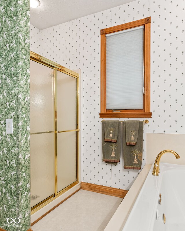2320 Whispering Way, Indianapolis, IN 46239 - full bathroom with wallpapered walls, a shower stall, and a jetted tub