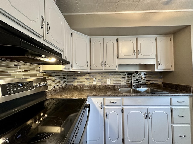 329 S Lockburn St, Indianapolis, IN 46241 - kitchen with stainless steel range with electric cooktop, dark countertops, white cabinets, and decorative backsplash