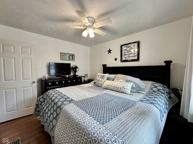 329 S Lockburn St, Indianapolis, IN 46241 - bedroom with wood finished floors, ceiling fan, and a textured ceiling