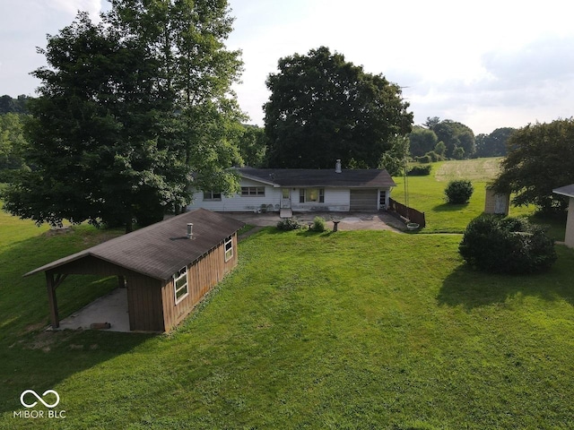 7514 E State Road 42, Poland, IN 47868 - view of front of property featuring a front yard, a patio area, and a carport