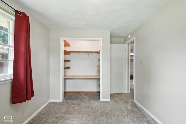 3504 White River Ct, Anderson, IN 46012 - unfurnished bedroom with carpet floors and a closet