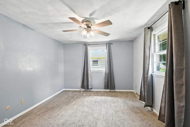 3504 White River Ct, Anderson, IN 46012 - carpeted spare room with a ceiling fan and baseboards