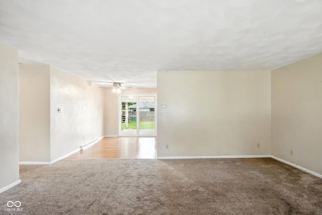 3504 White River Ct, Anderson, IN 46012 - carpeted empty room with baseboards and a ceiling fan