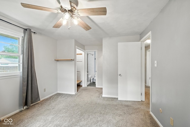 3504 White River Ct, Anderson, IN 46012 - unfurnished bedroom with carpet, a ceiling fan, and ensuite bathroom