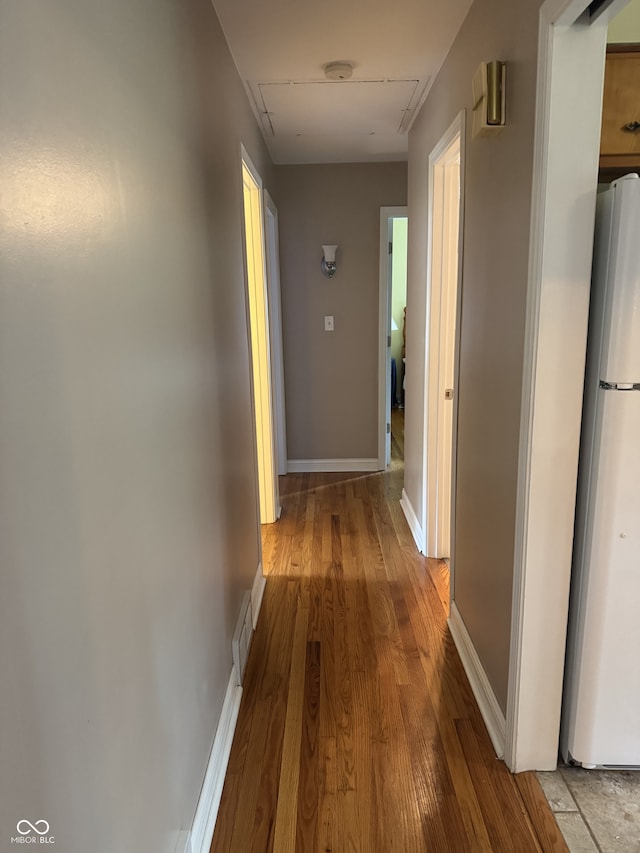 4032 Roselawn Ave, Columbus, IN 47203 - hall featuring wood finished floors and attic access