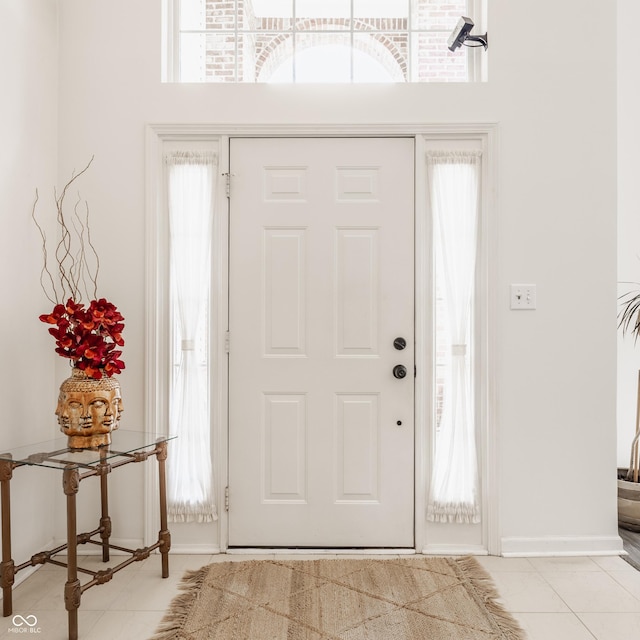 13390 Grosbeak Ct, Carmel, IN 46033 - foyer entrance featuring baseboards and light tile patterned floors