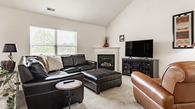 13390 Grosbeak Ct, Carmel, IN 46033 - living area with light carpet, vaulted ceiling, and a fireplace