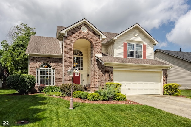 13390 Grosbeak Ct, Carmel, IN 46033 - traditional-style home with brick siding, a shingled roof, concrete driveway, a front yard, and a garage