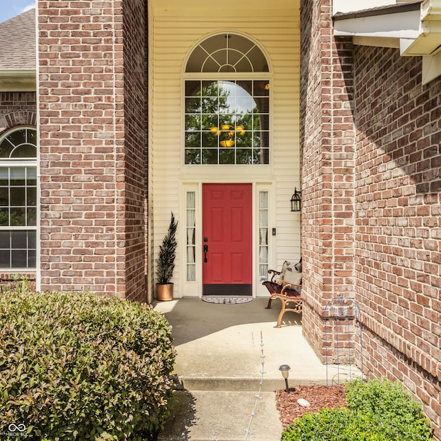 13390 Grosbeak Ct, Carmel, IN 46033 - property entrance featuring brick siding and a porch
