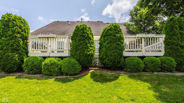 13390 Grosbeak Ct, Carmel, IN 46033 - back of house with a deck, a yard, and roof with shingles