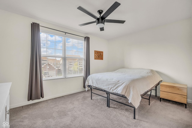 5353 Hibiscus Dr, Plainfield, IN 46168 - carpeted bedroom with baseboards and a ceiling fan
