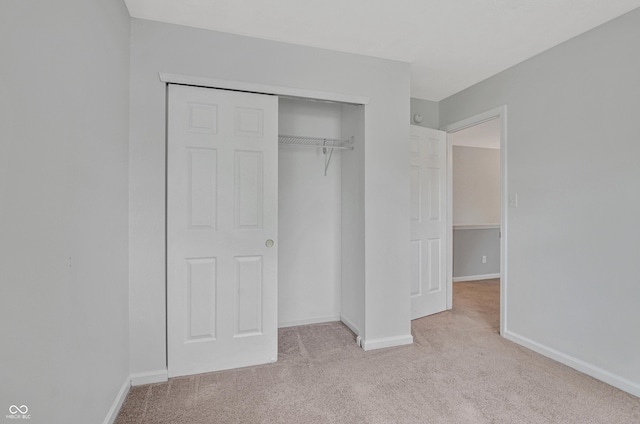 5541 Lippan Way, Indianapolis, IN 46221 - unfurnished bedroom featuring carpet and a closet