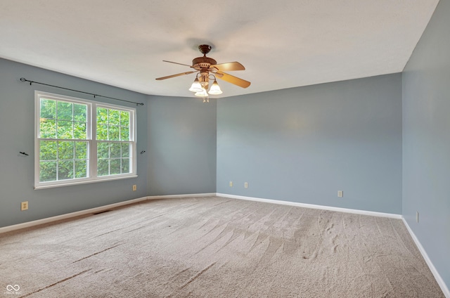 5541 Lippan Way, Indianapolis, IN 46221 - spare room featuring carpet flooring and a ceiling fan