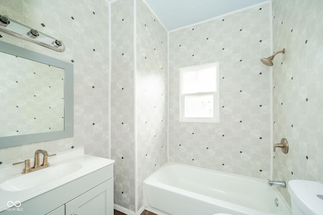 2627 Chase St, Anderson, IN 46016 - full bath with tile walls, vanity, and shower / bathtub combination