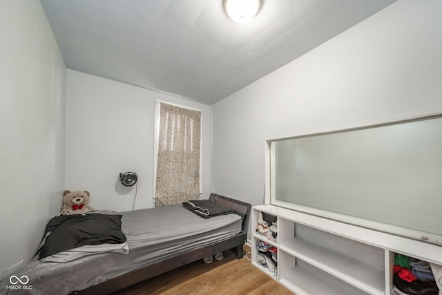 2627 Chase St, Anderson, IN 46016 - bedroom featuring wood finished floors and lofted ceiling