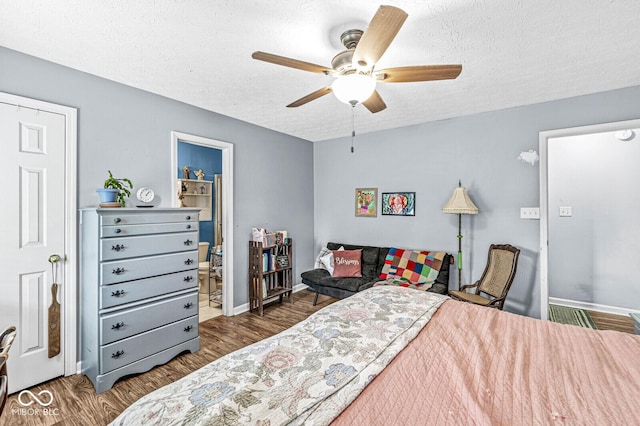 5865 Pennekamp Dr, Plainfield, IN 46168 - bedroom with wood finished floors, a textured ceiling, and ceiling fan