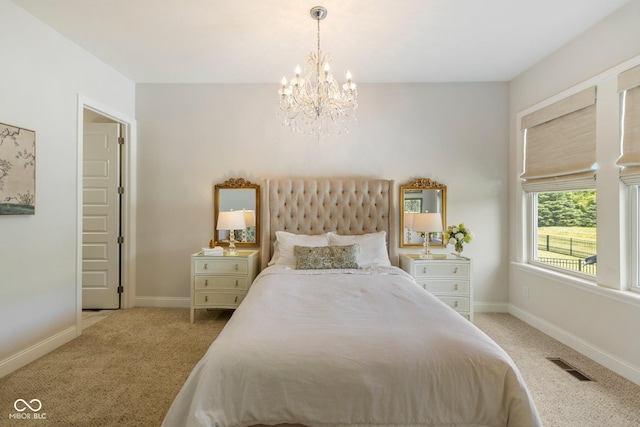 2566 Maple Creek Dr, Westfield, IN 46074 - bedroom featuring light colored carpet and a chandelier