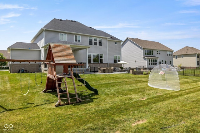 2566 Maple Creek Dr, Westfield, IN 46074 - back of house with a playground, a residential view, and a patio area