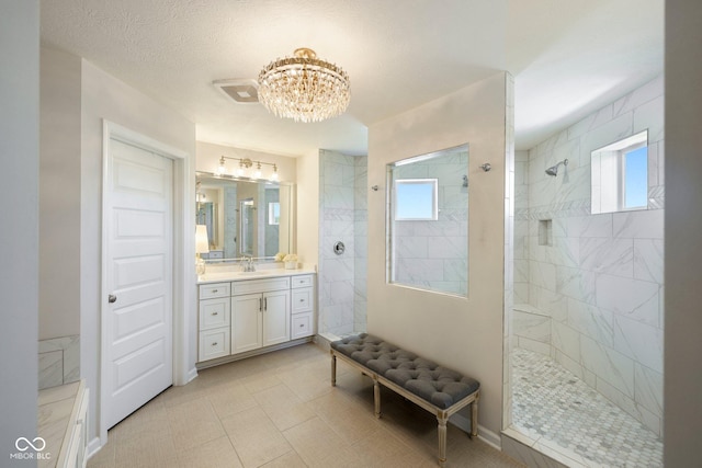 2566 Maple Creek Dr, Westfield, IN 46074 - full bathroom with a chandelier, plenty of natural light, vanity, and a walk in shower