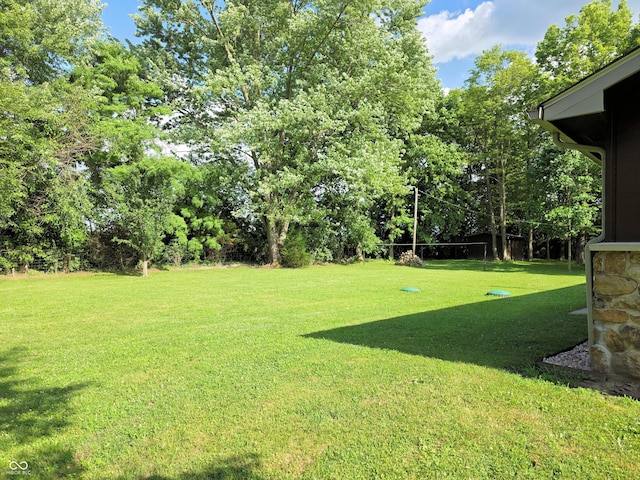 3303 N 850 E, Columbus, IN 47203 - view of green lawn with view of wooded area
